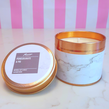 Load image into Gallery viewer, Marble and rose gold tin candle label shows scent is pomegranate and fig natural soy candle. lid is off