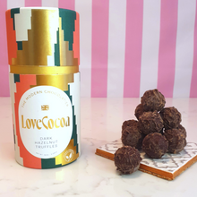 Load image into Gallery viewer, Vegan chocolate hazelnut truffles next to Love Cocoa chocolate box
