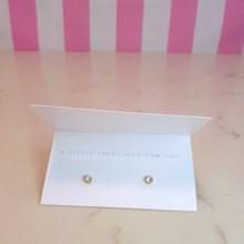 Load image into Gallery viewer, A white card with a pair of gold diamante earrings on it and the message &quot;A little treat just for you!&quot;
